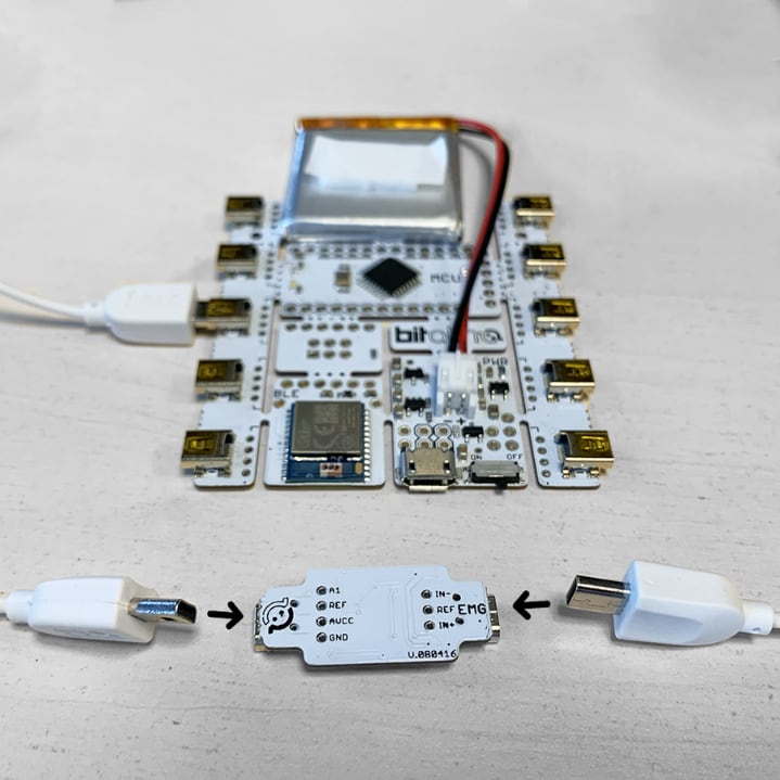 Both cables being connected to the EMG sensor module