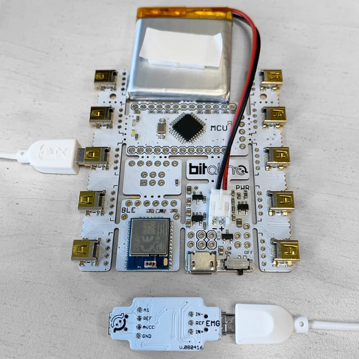 The assembled chain: board, cable, EMG module